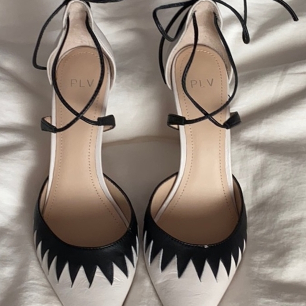 Sophisticated Black and White Heels with Pointed Toe